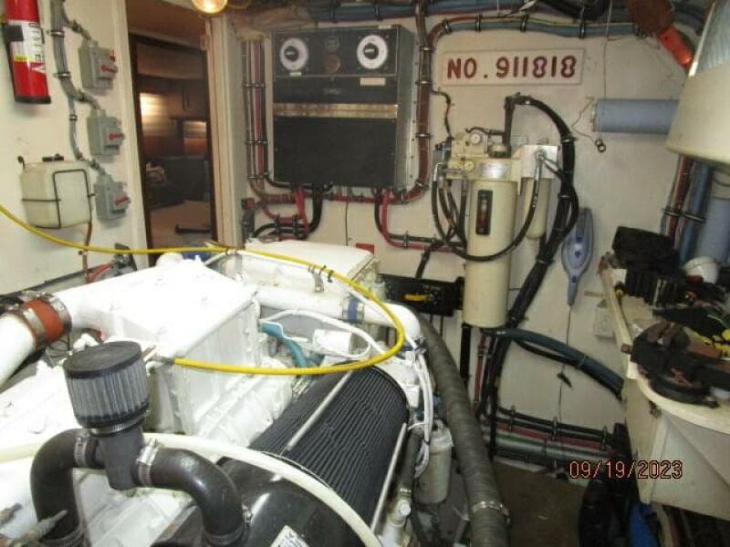 63' Hatteras starboard engine room forward