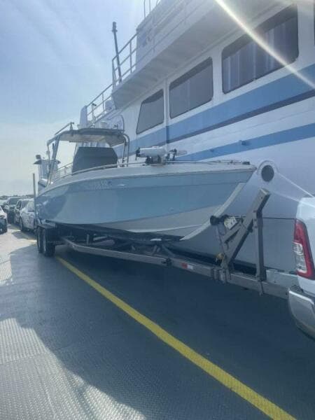 1990 Wellcraft Scarab 30 Cuddy