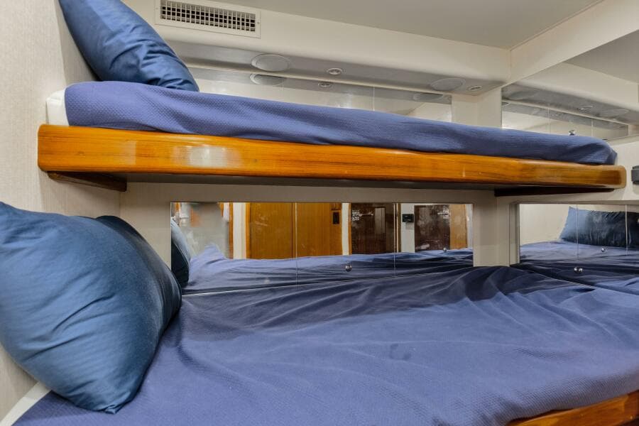 2001 65 Viking Convertible Enclosed Bridge Partnership Crew Stateroom