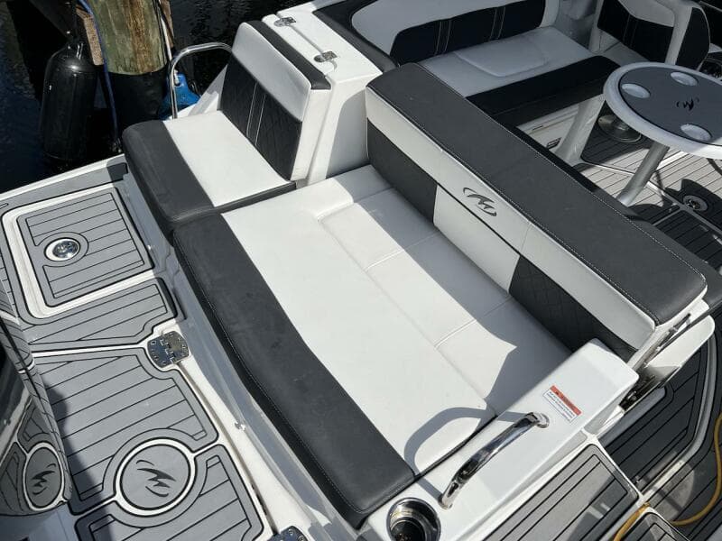 Monterey M-45 2022 boat interior with black and white seating and deck.