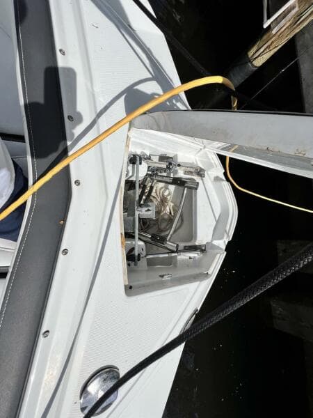 2022 Monterey M-45 boat with open anchor locker and visible wiring.