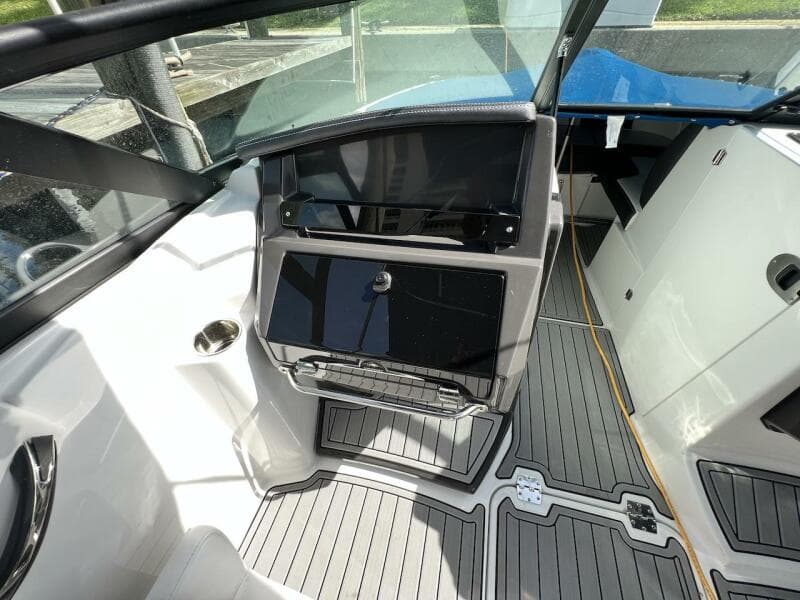 Interior of a 2022 Monterey M-45 boat with modern dashboard and seating.