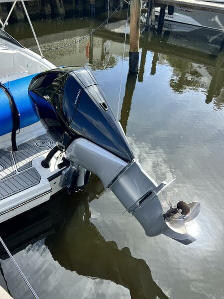 2022 Monterey M-45 boat with an outboard motor docked in a marina.