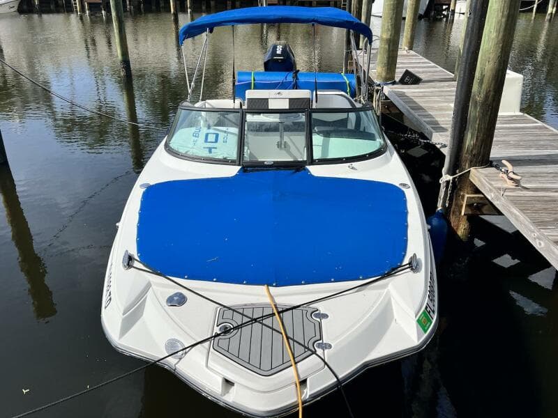 2022 Monterey M-45 boat docked with blue cover and canopy.