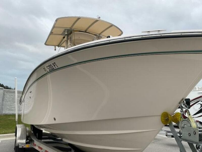 2014 Grady-White Fisherman 257 boat on trailer, side view.