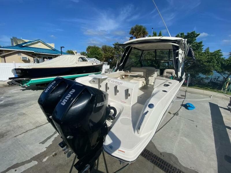 2018 Boston Whaler 270 Vantage boat with dual Mercury outboard engines.
