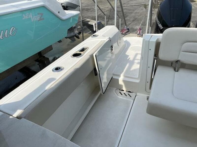 2018 Boston Whaler 270 Vantage boat interior with open storage compartment.