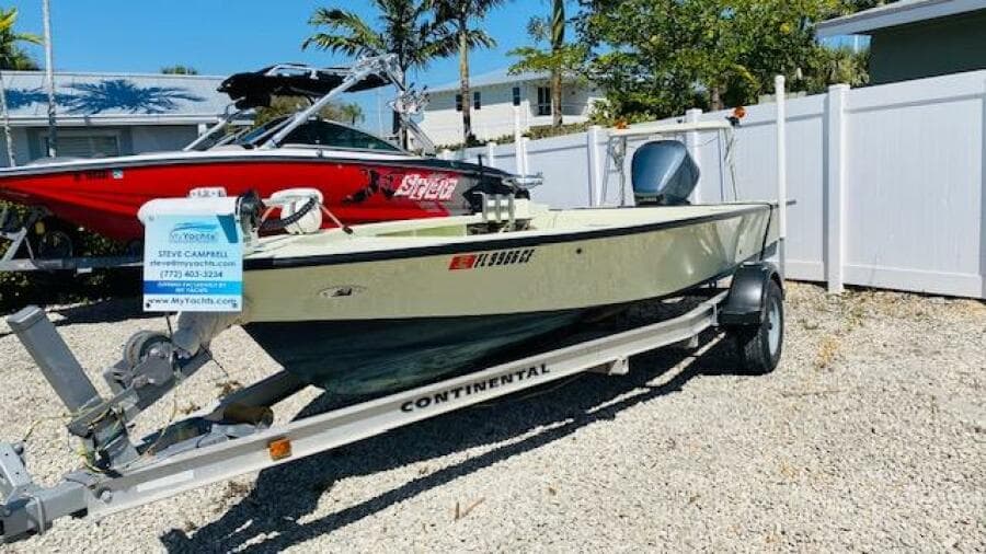 1983 Maverick 18 Flats Boat on Continental trailer in outdoor setting.