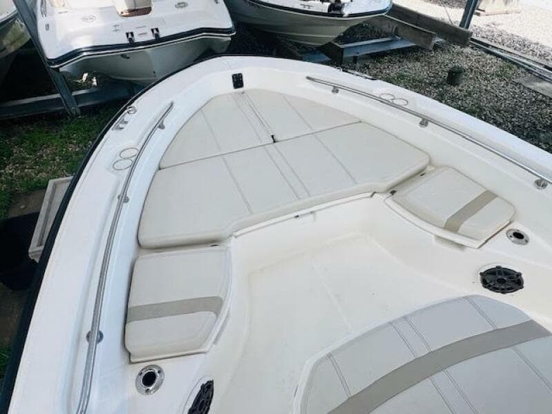 2023 Boston Whaler 250 Dauntless boat interior with cushioned seating.