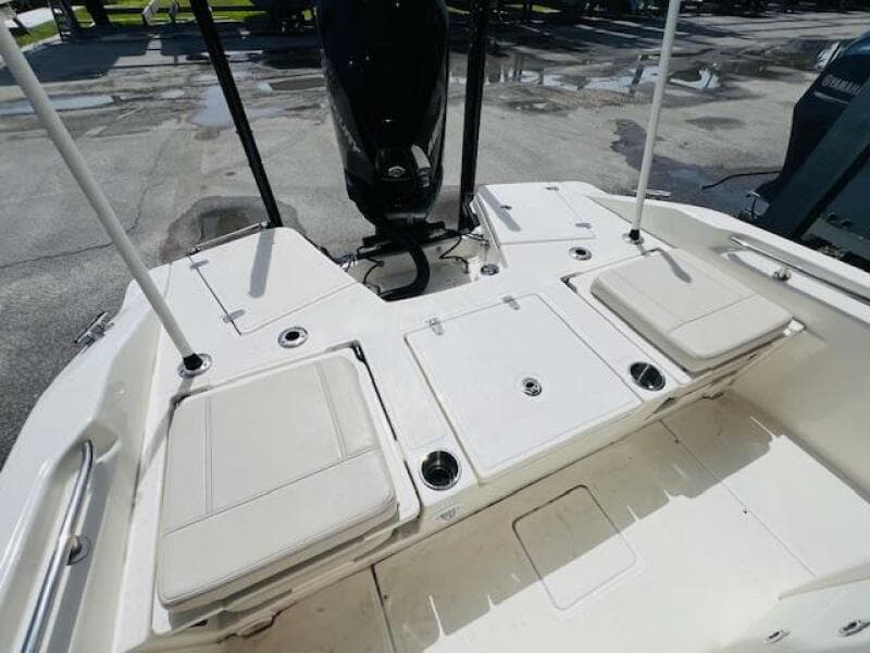 2023 Boston Whaler 250 Dauntless boat interior with cushioned seating and storage compartments.