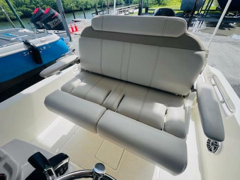 2023 Boston Whaler 250 Dauntless boat interior with cushioned seating.