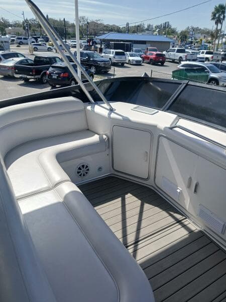 1997 Sea Ray 550 Sedan Bridge yacht with spacious seating and sleek design.