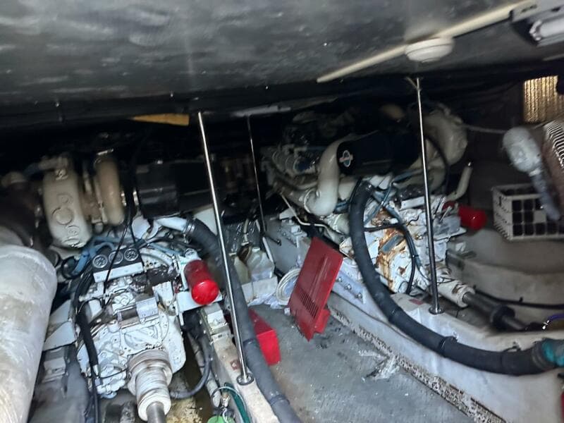Engine room of a 1997 Sea Ray 550 Sedan Bridge yacht showing twin engines.