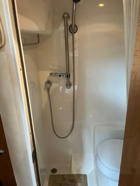 2003 Regal Commodore 3860 yacht bathroom with shower and toilet.