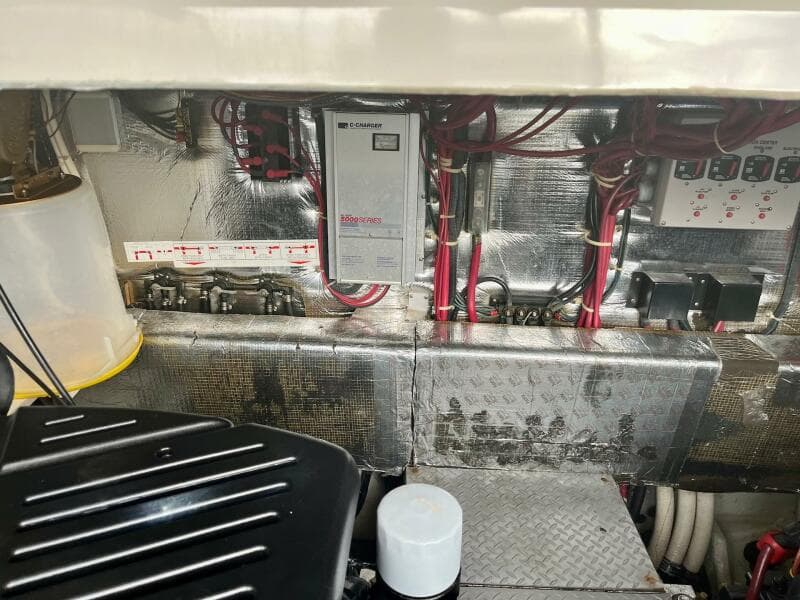 Engine compartment of a 2003 Regal Commodore 3860 boat with wiring and components.