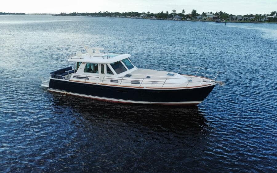 2013 Sabre 48 Salon Express yacht cruising on calm waters.