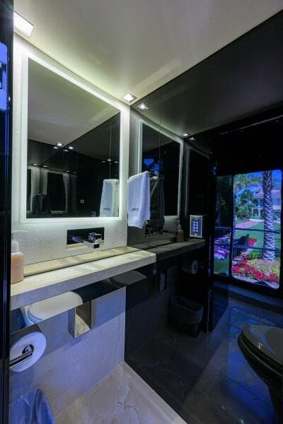 Luxurious bathroom in a 1997 Broward 108 Raised Pilothouse yacht.
