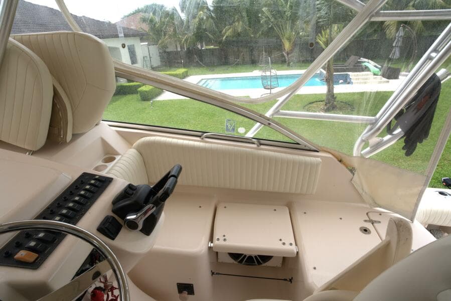 2007 Grady-White Express 330 boat interior with pool view in background.