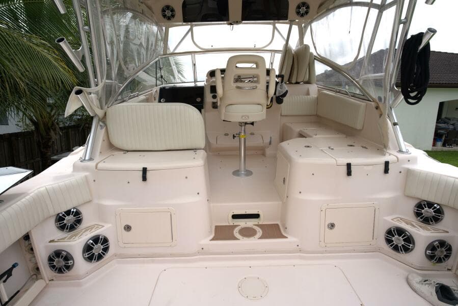 2007 Grady-White Express 330 boat interior with seating and helm station.