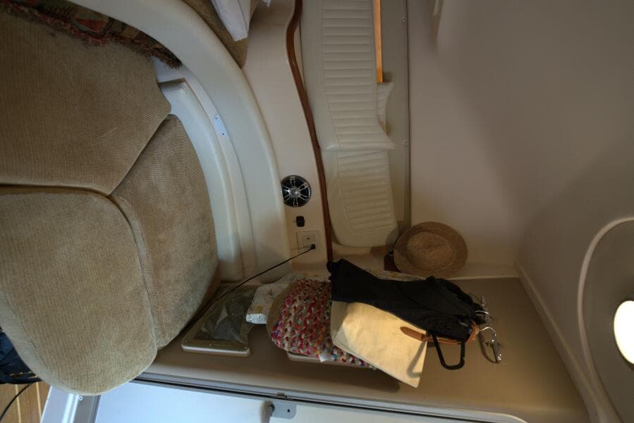 Interior cabin of 2007 Grady-White Express 330 with seating and storage.