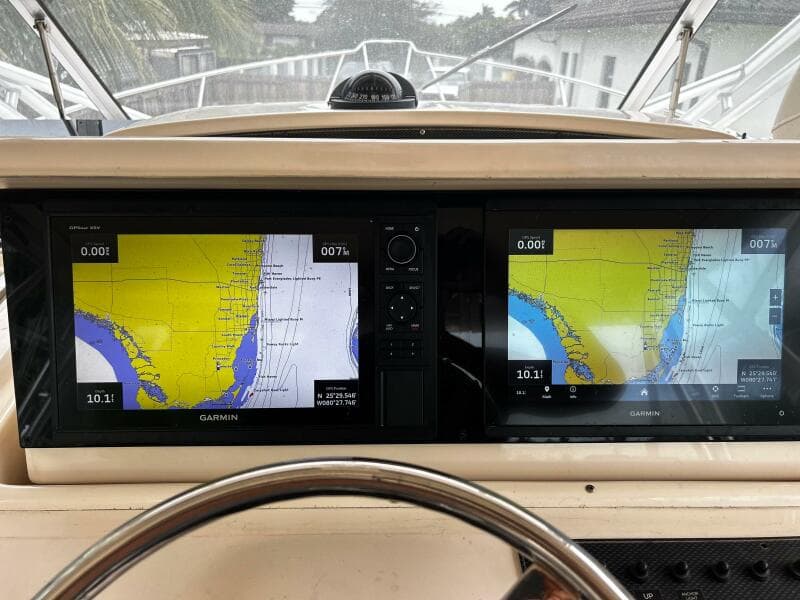 2007 Grady-White Express 330 boat dashboard with dual Garmin navigation screens.
