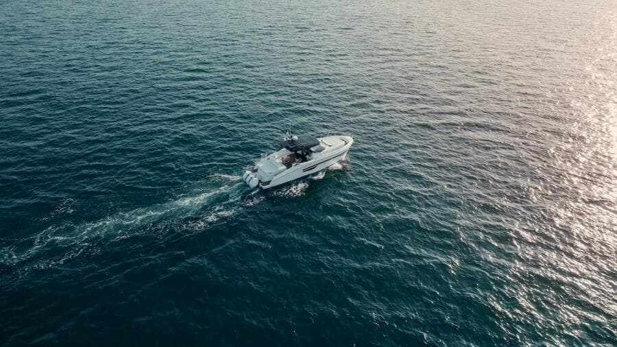 Aerial view of 2024 Oryx 379 boat cruising on open water.