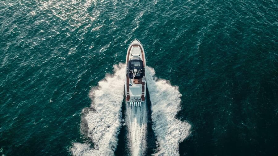 Aerial view of 2024 Oryx 379 boat cruising on open water.
