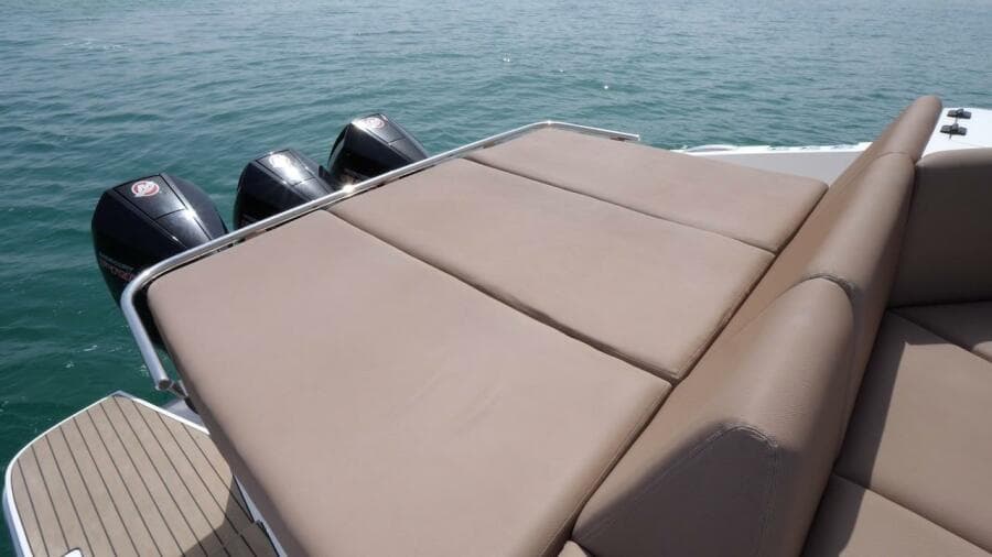 2024 Oryx 379 boat with triple outboard engines and sunbed.