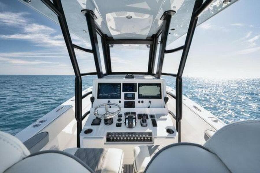 2022 Invincible 36 Open Fisherman boat dashboard with ocean view.