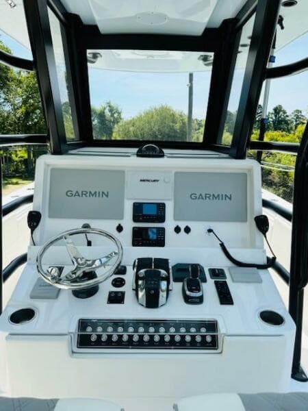 2022 Invincible 36 Open Fisherman dashboard with Garmin navigation systems.