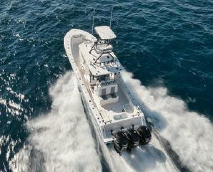 2022 Invincible 36 Open Fisherman boat cruising on open water.