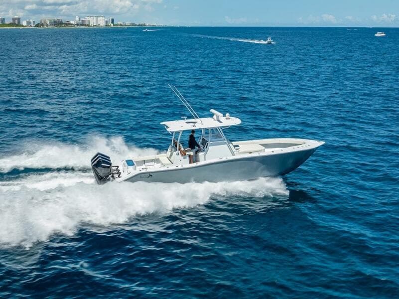 2025 Billfish 39 Center Console boat cruising on open ocean.
