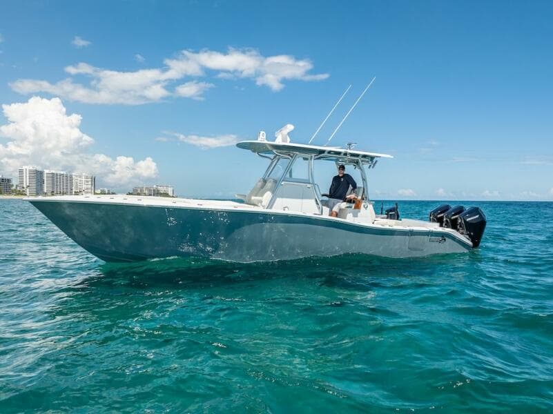 2025 Billfish 39 Center Console boat on clear blue water.