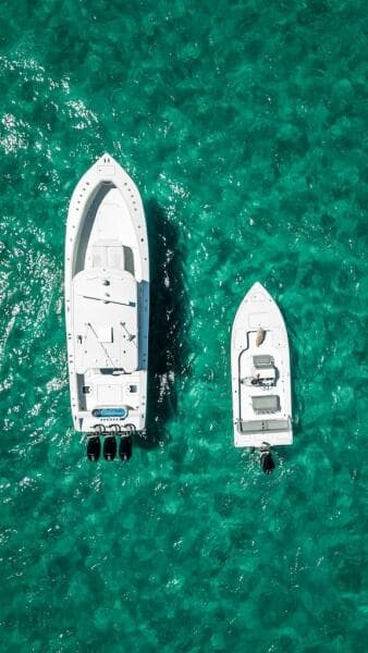 Aerial view of 2025 Billfish 39 Center Console boat on turquoise water.