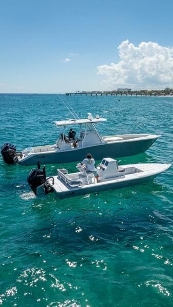2025 Billfish 39 Center Console boats on clear blue ocean water.