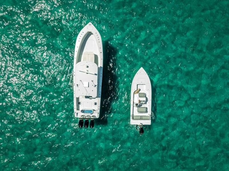 Aerial view of 2025 Billfish 39 Center Console boat on turquoise water.
