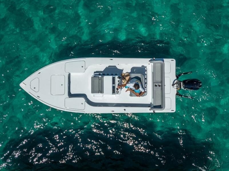 Aerial view of 2025 Billfish 39 Center Console boat on clear turquoise water.