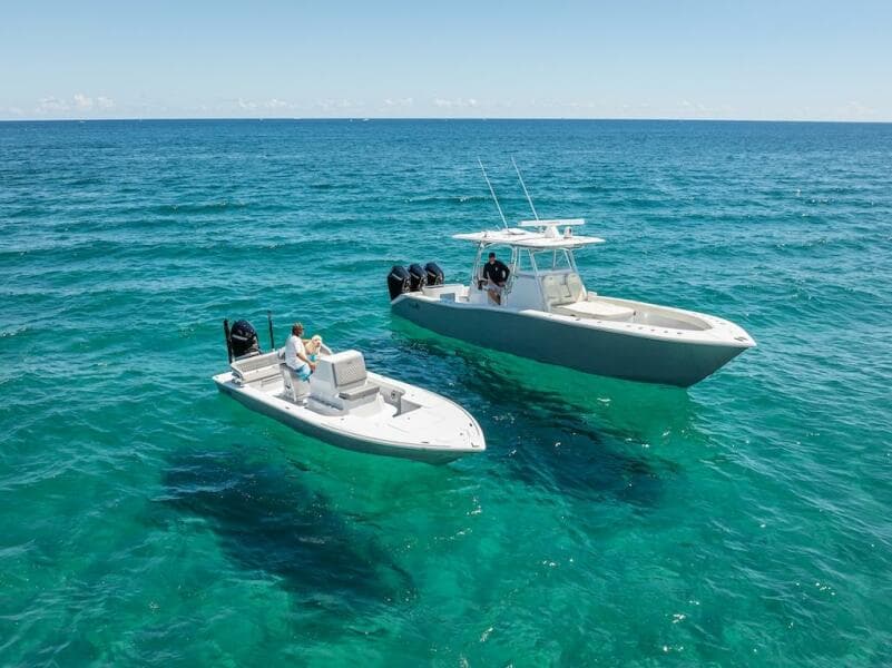 2025 Billfish 39 Center Console with Tower on clear blue ocean.