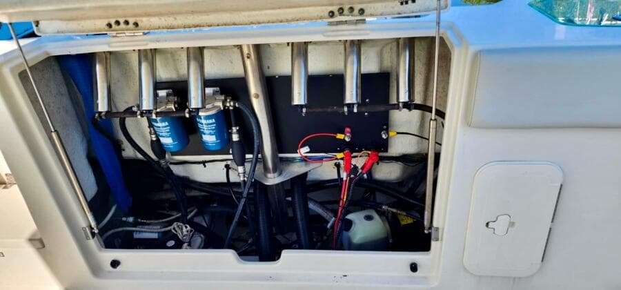 2021 Sailfish 272 CC boat engine compartment with wiring and filters.