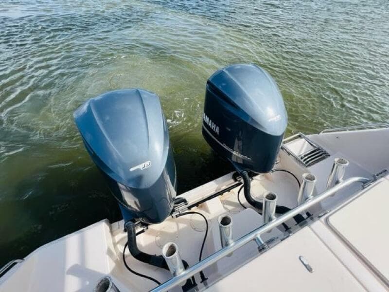 2014 Grady-White Freedom 335 with twin Yamaha outboard engines on water.