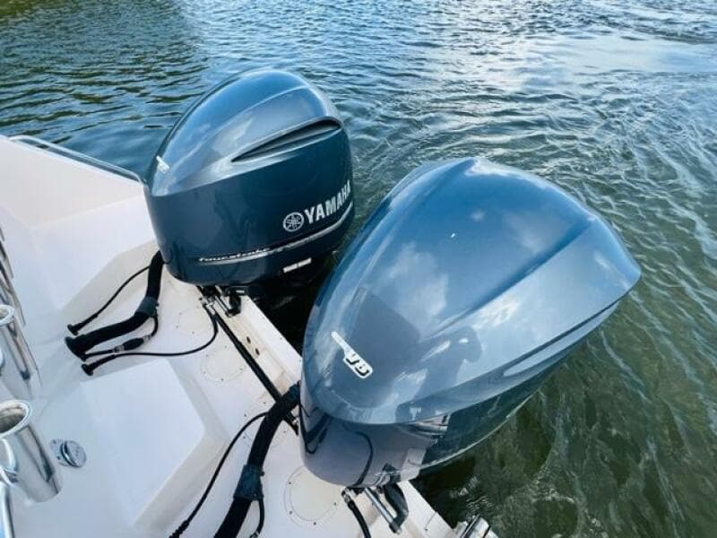 2014 Grady-White Freedom 335 with twin Yamaha outboard engines on water.