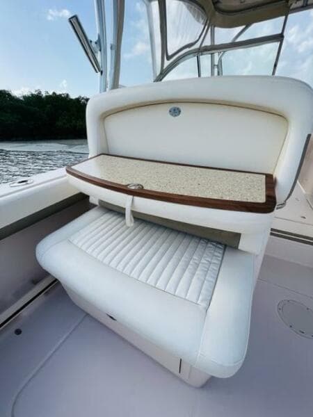 2014 Grady-White Freedom 335 boat interior seating with foldable table.