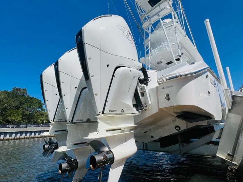 2015 Billfish 39 Custom CC boat with twin outboard engines docked.