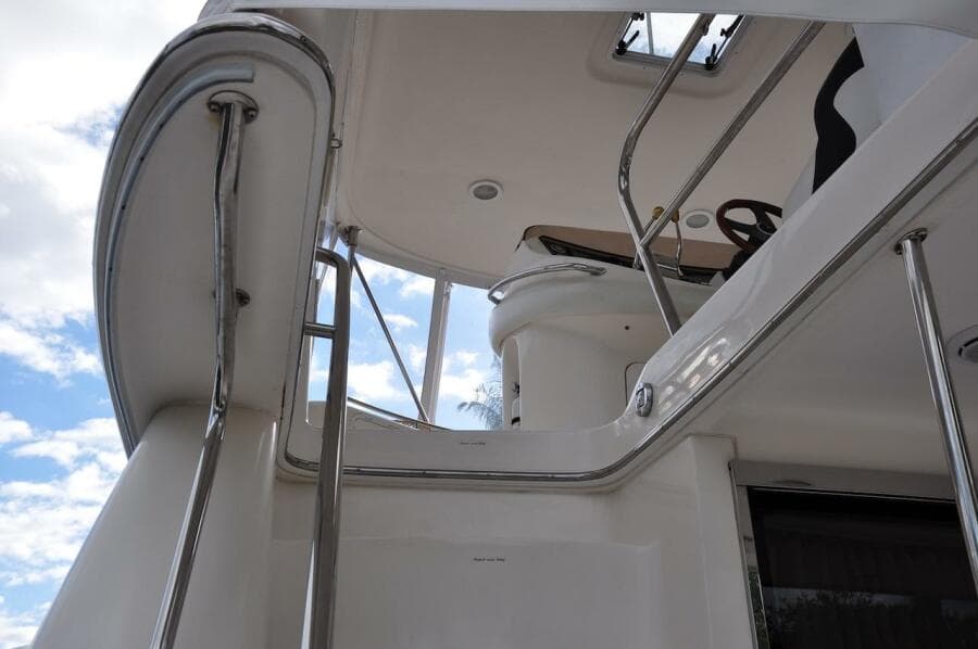 View of the upper deck and helm of a 1998 Sea Ray 480 Sedan Bridge yacht.
