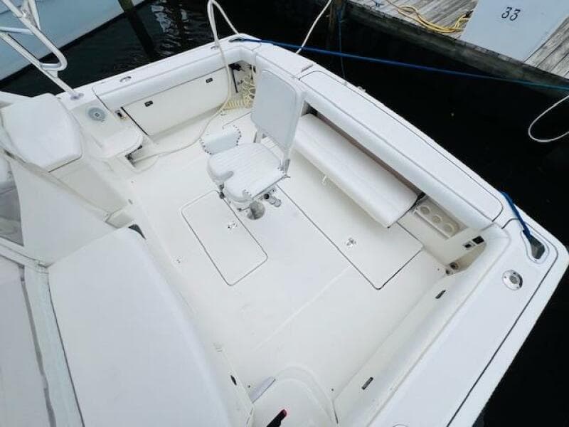 2003 Tiara Yachts 3800 Open boat deck with seating and storage.