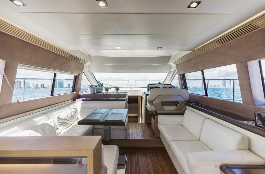 Luxurious interior of 2015 Beneteau Monte Carlo 5 yacht with panoramic windows.