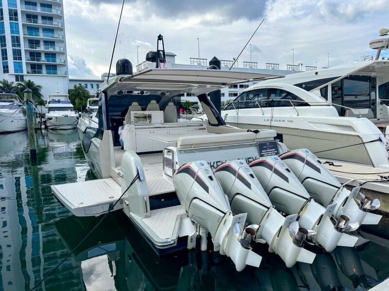 2023 Azimut Verve 47 yacht docked with four powerful outboard engines.