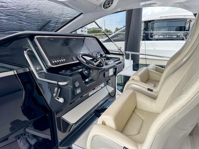 2023 Azimut Verve 47 helm with modern controls and luxurious seating.