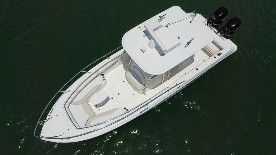 2008 Boston Whaler 320 Outrage boat with twin engines, aerial view.