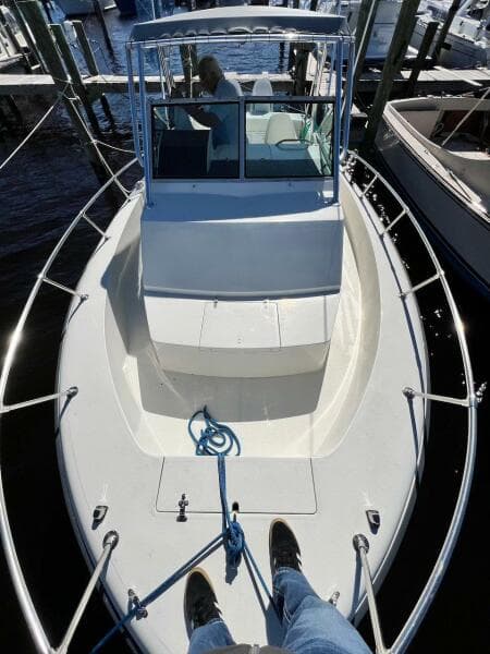 1988 Grady-White 25 SAILFISH boat docked at marina, top view.